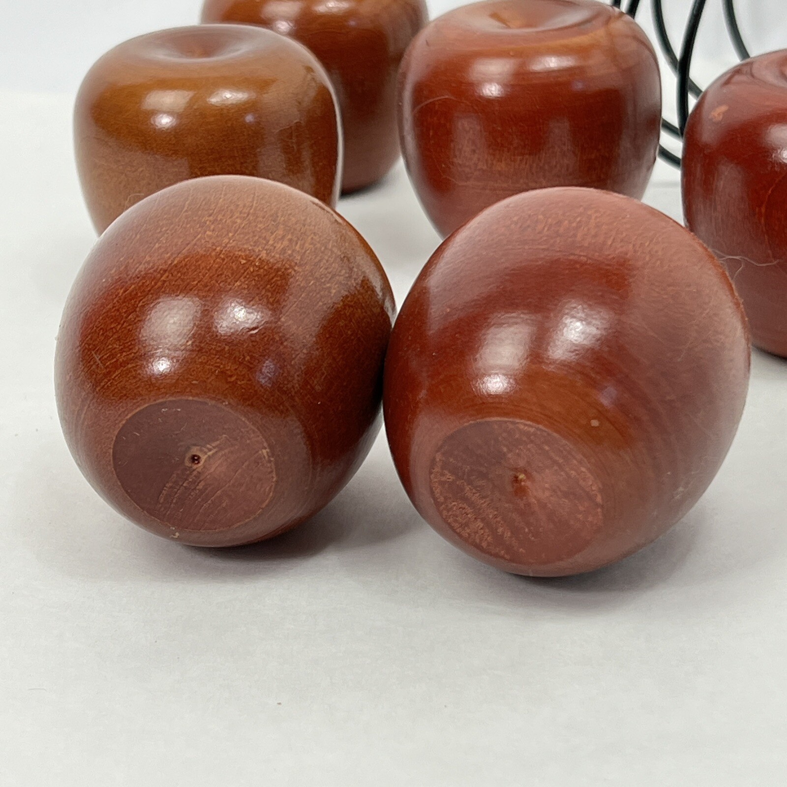 Set of 6 Decorative Wooden Apple no stem in a wired basket