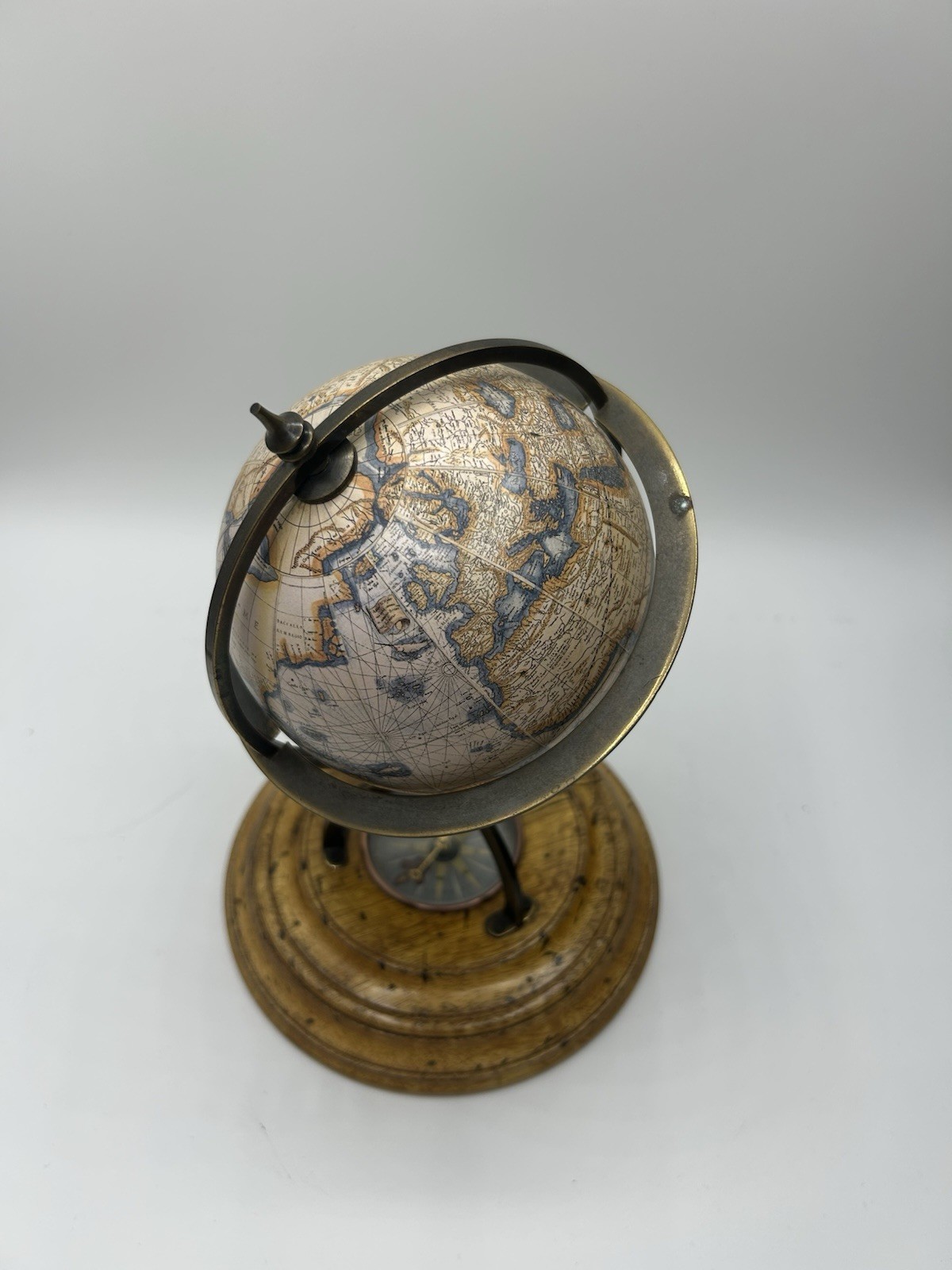 Authentic models vintage style globe with built in compass. 6” wide, 9” high
