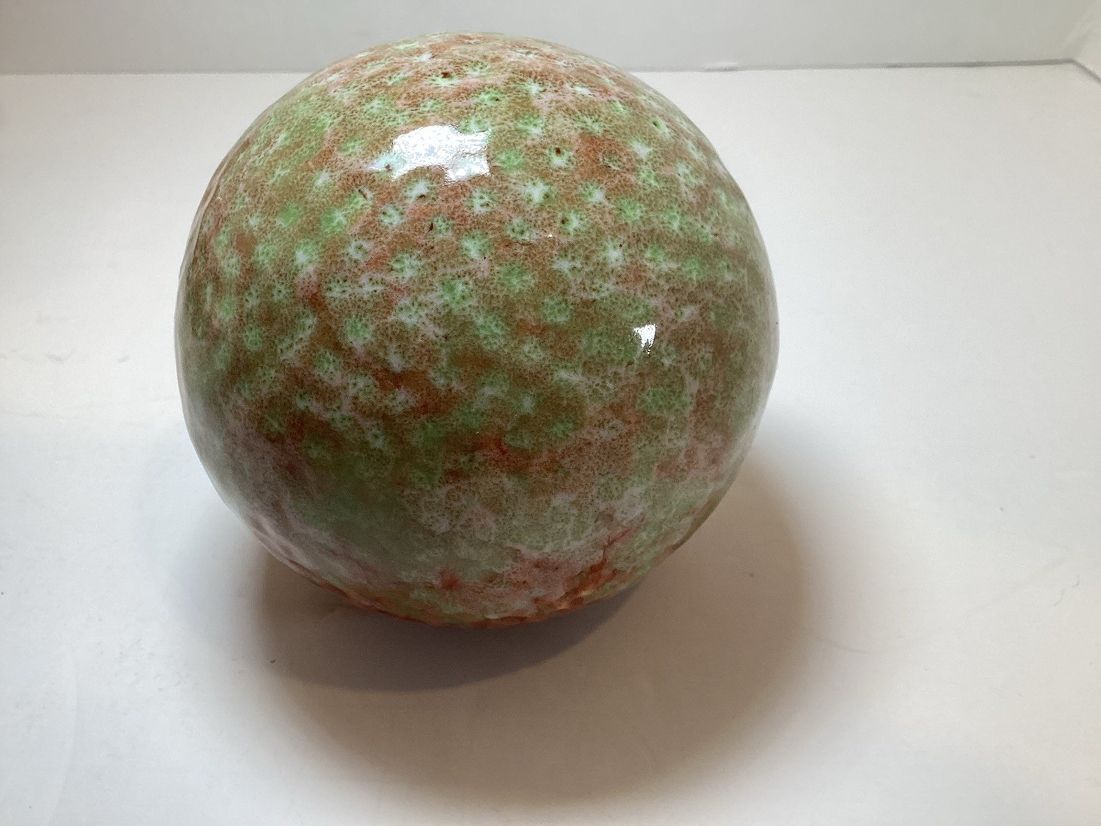 Set of 4 Glazed Ceramic 3.25” Decorative Balls in Rust and Green Colors