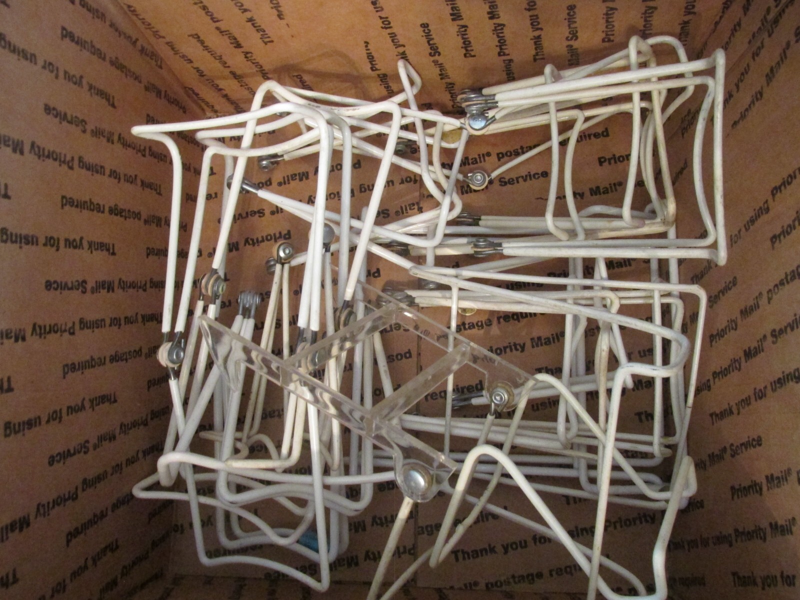 **Reduced** – LOT OF 20 EASLES FOLDING WHITE COATED METAL SIZES VARY, MANY NEW