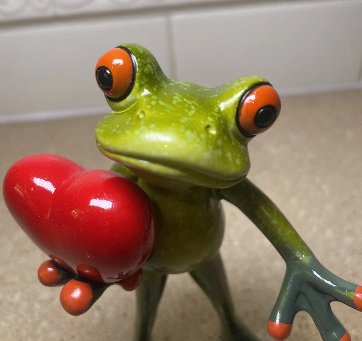 Frog Figurine Holding A Red Heart