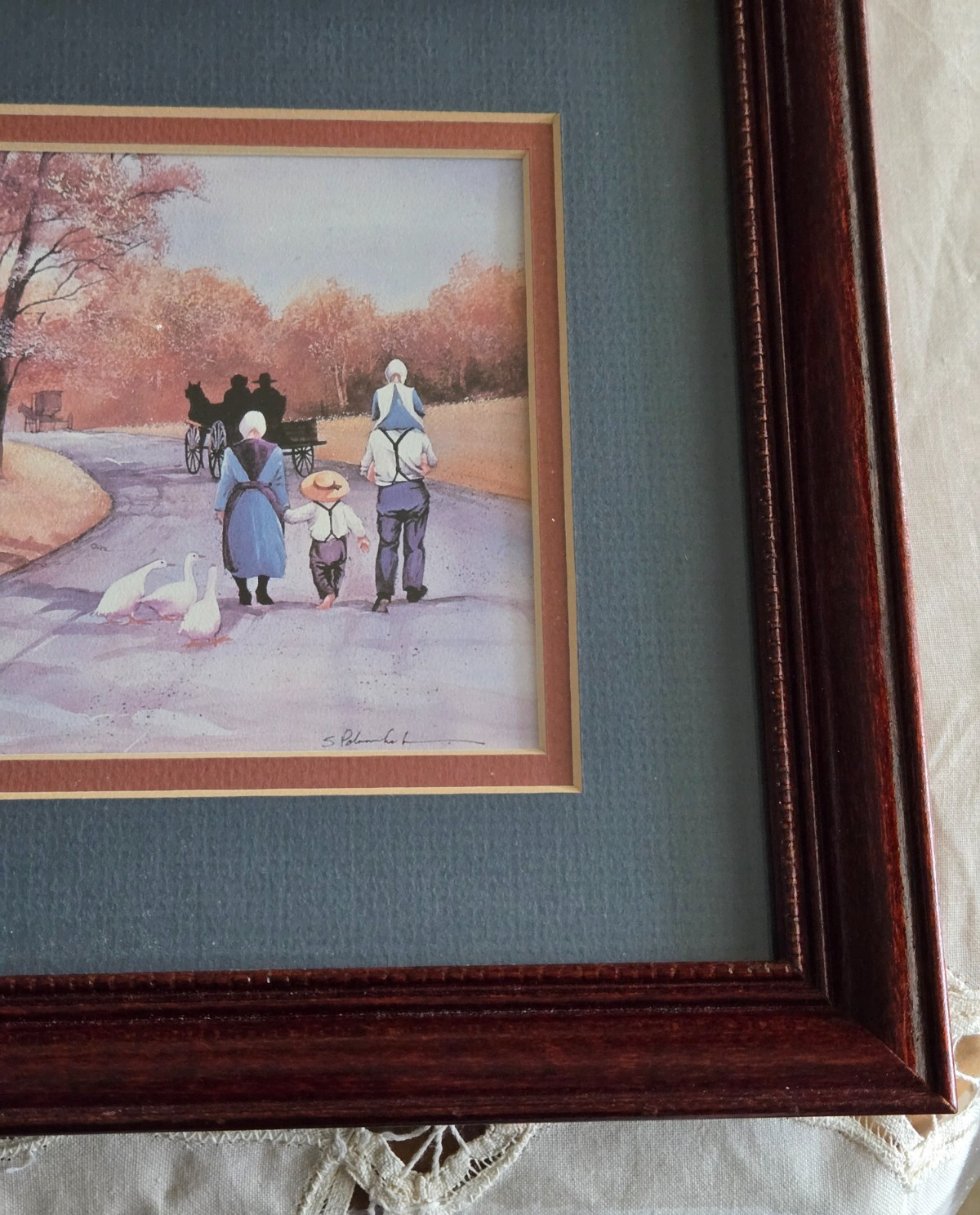AMISH FAMILY TAKING A FALL WALK by STEVE POLOMCHAK fraamed print -11.5 x 9.5”