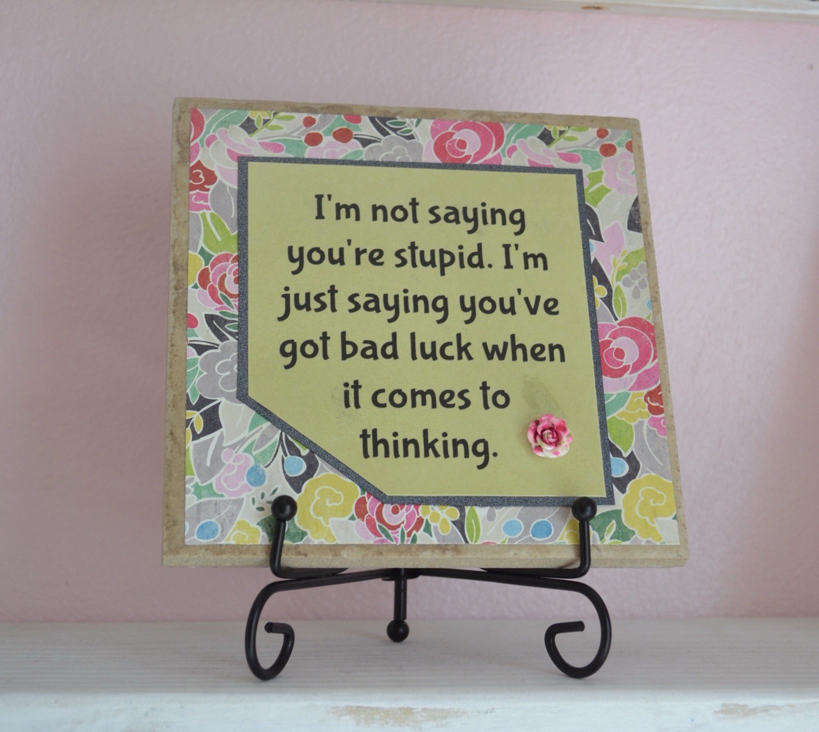 Decorative Tile With Funny Saying About Stupidity On It