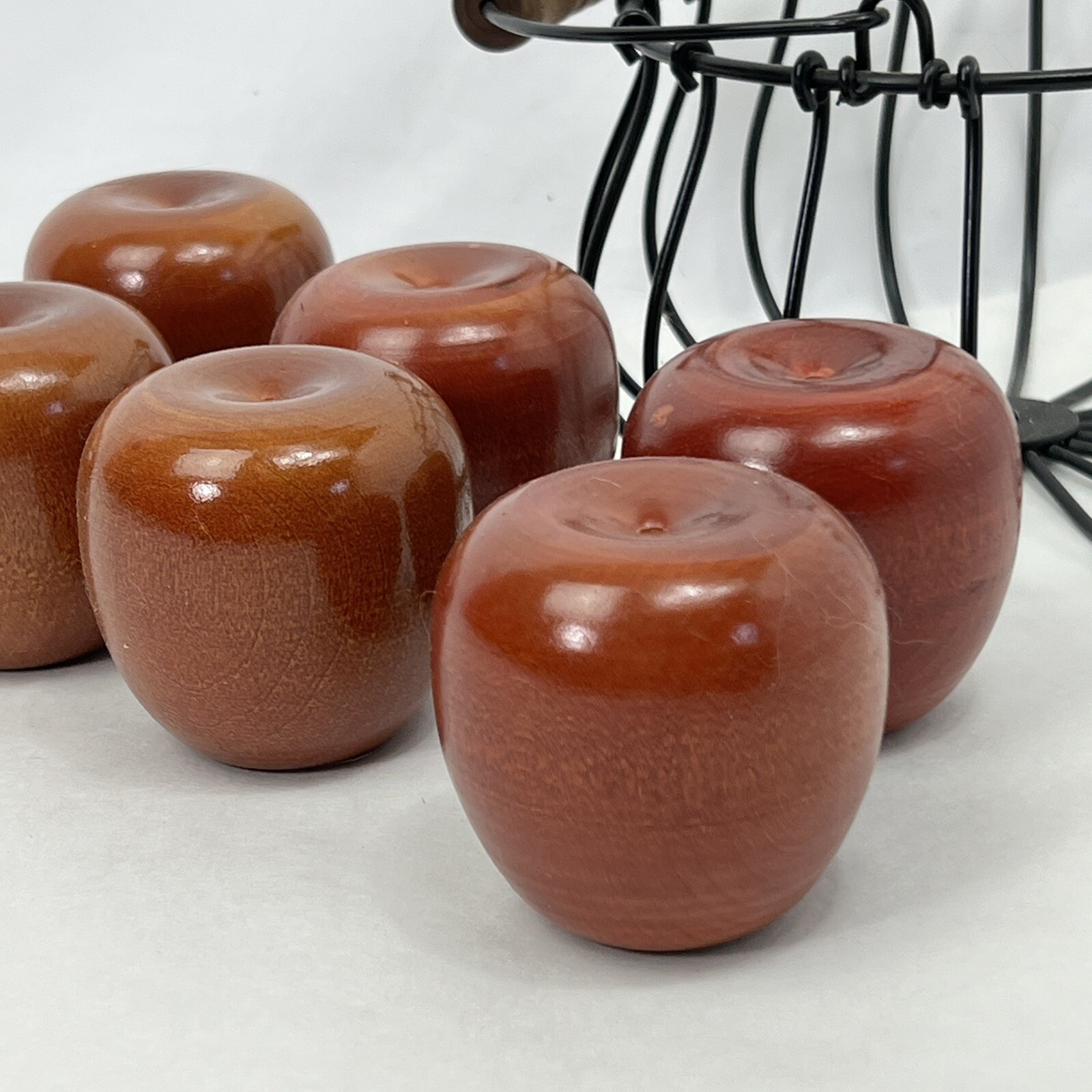 Set of 6 Decorative Wooden Apple no stem in a wired basket