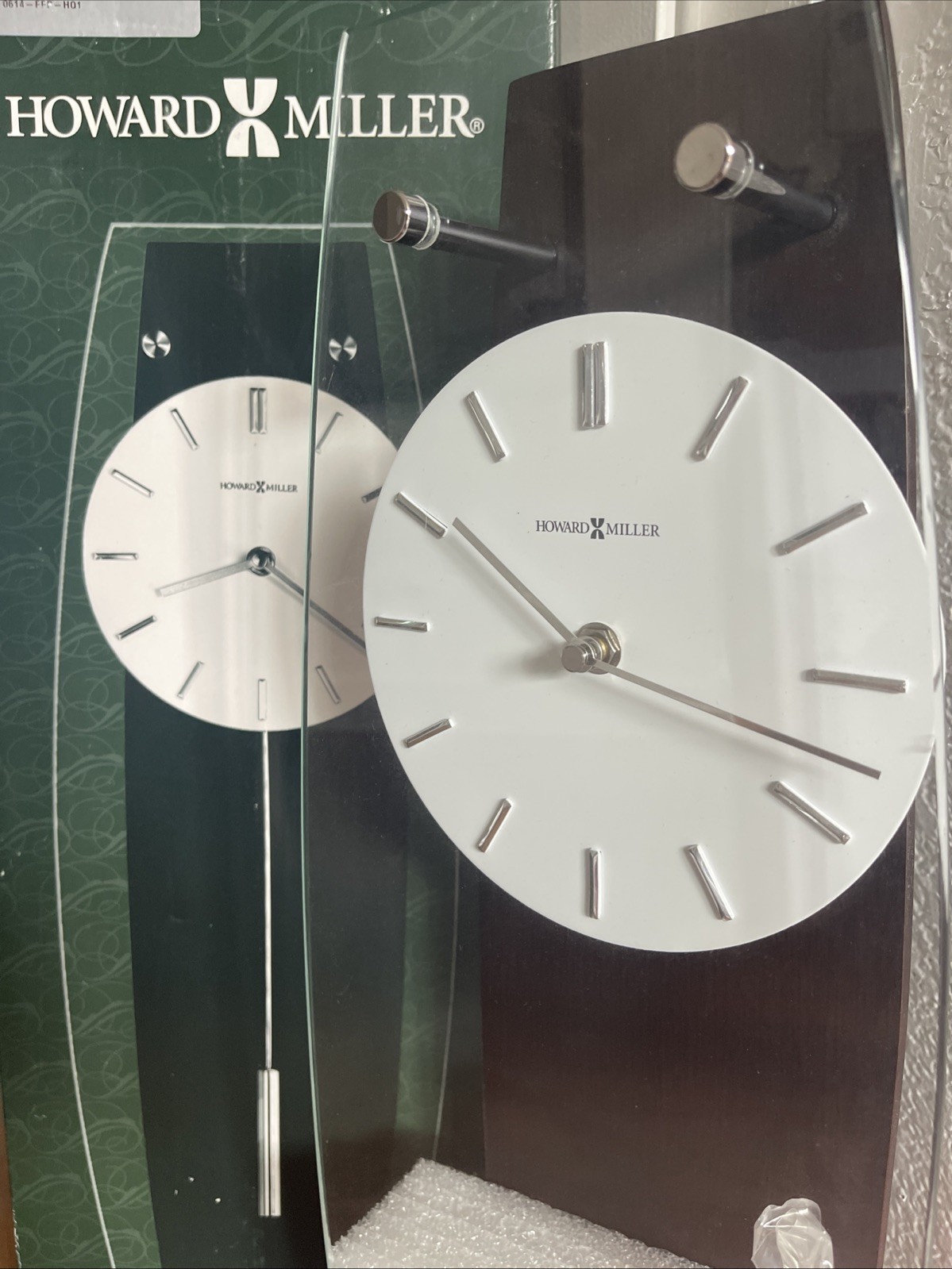 Howard Miller 625401 Wall Clock Pendulum Black White Analog Display