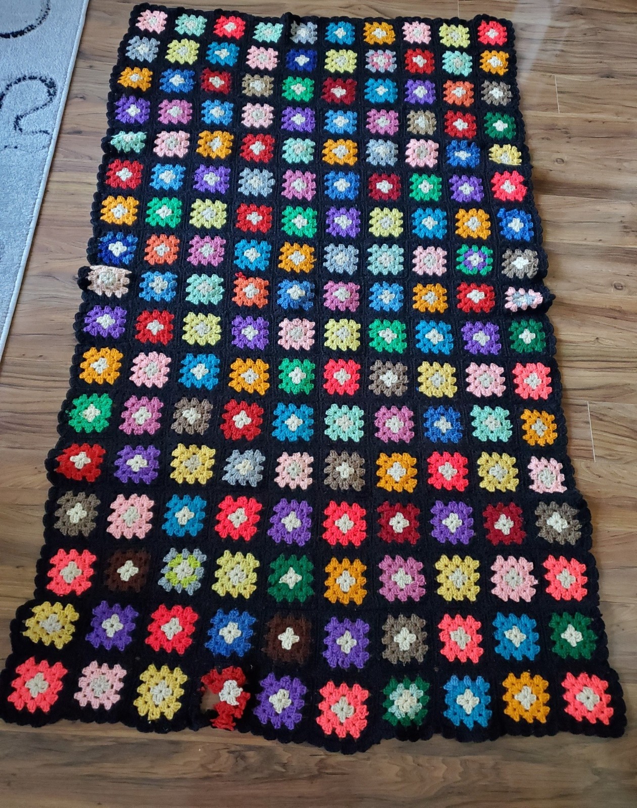 Vintage Handmade Colorful Granny Square Afghan 66″ x 38″ Black Background