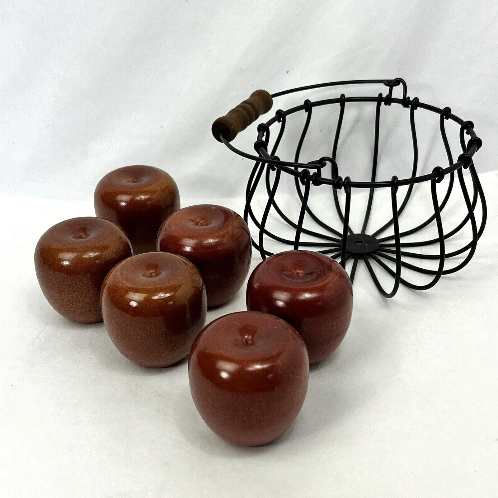 Set of 6 Decorative Wooden Apple no stem in a wired basket