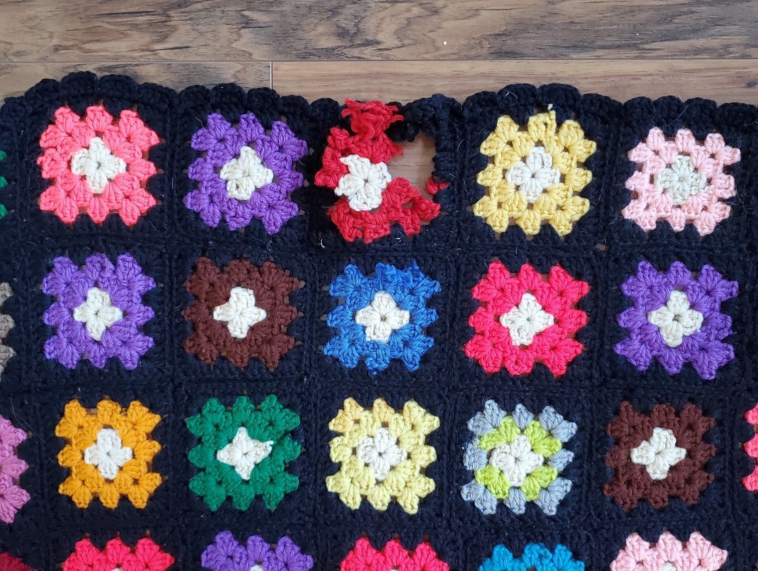 Vintage Handmade Colorful Granny Square Afghan 66″ x 38″ Black Background