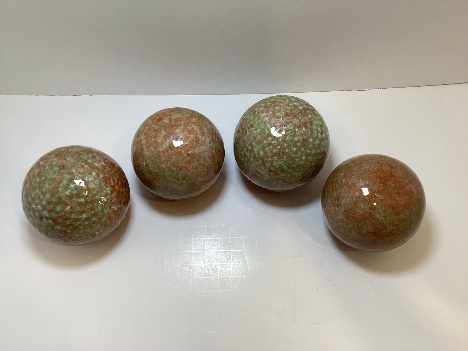 Set of 4 Glazed Ceramic 3.25” Decorative Balls in Rust and Green Colors