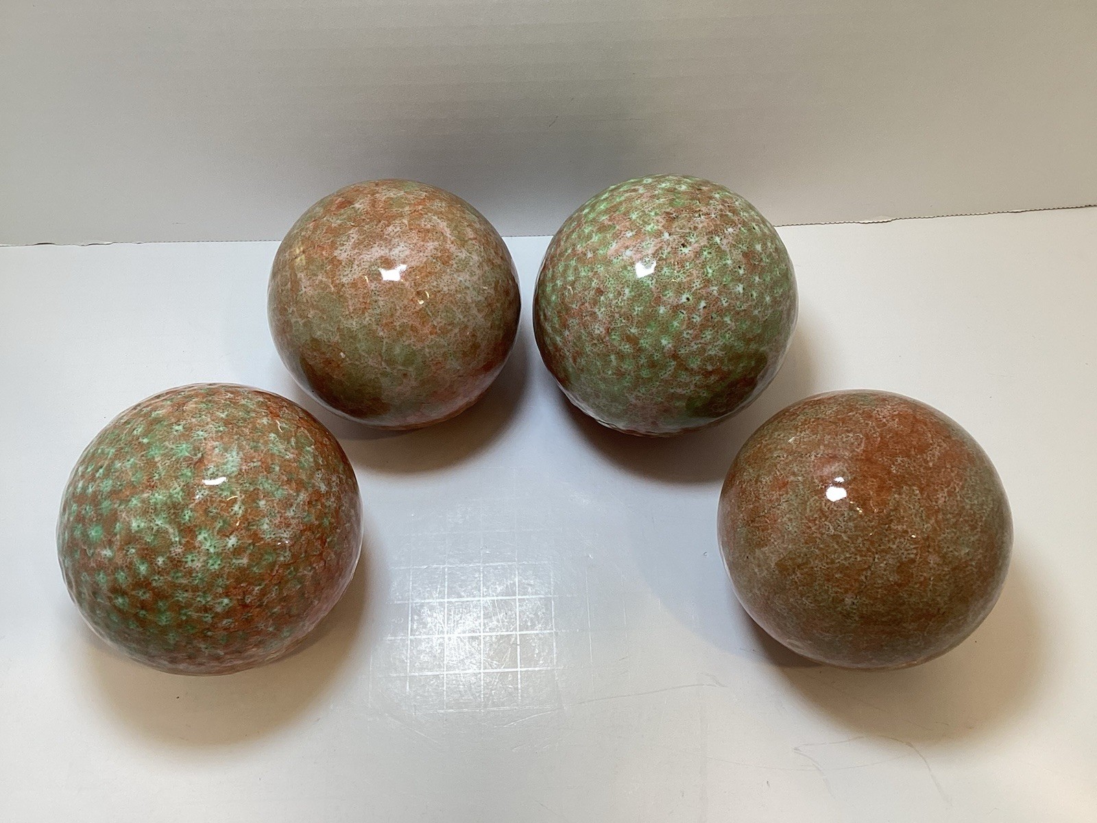 Set of 4 Glazed Ceramic 3.25” Decorative Balls in Rust and Green Colors