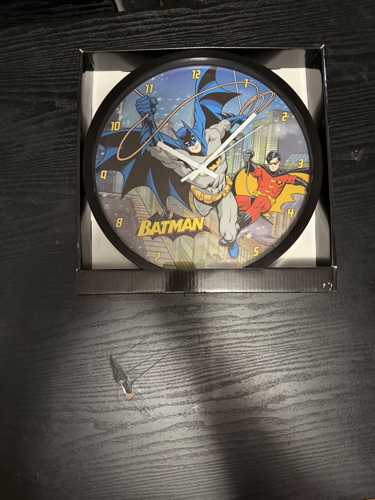 DC Comics Batman and Robin analog wall clock featuring a blue-bordered design