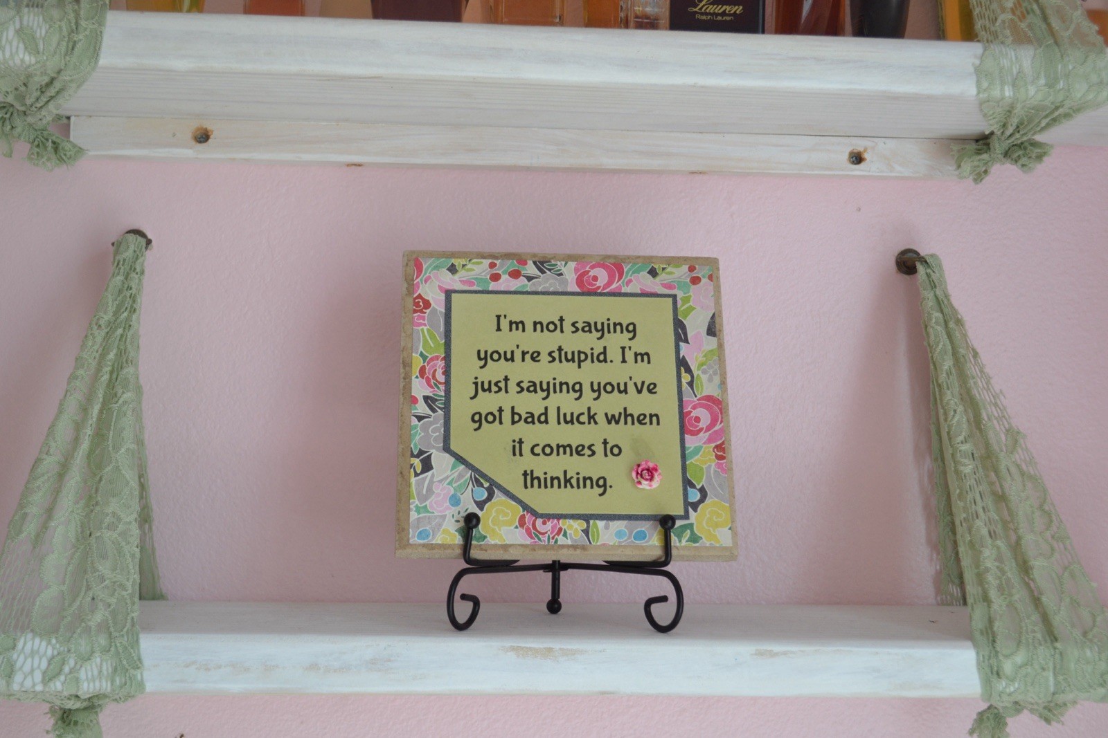 Decorative Tile With Funny Saying About Stupidity On It