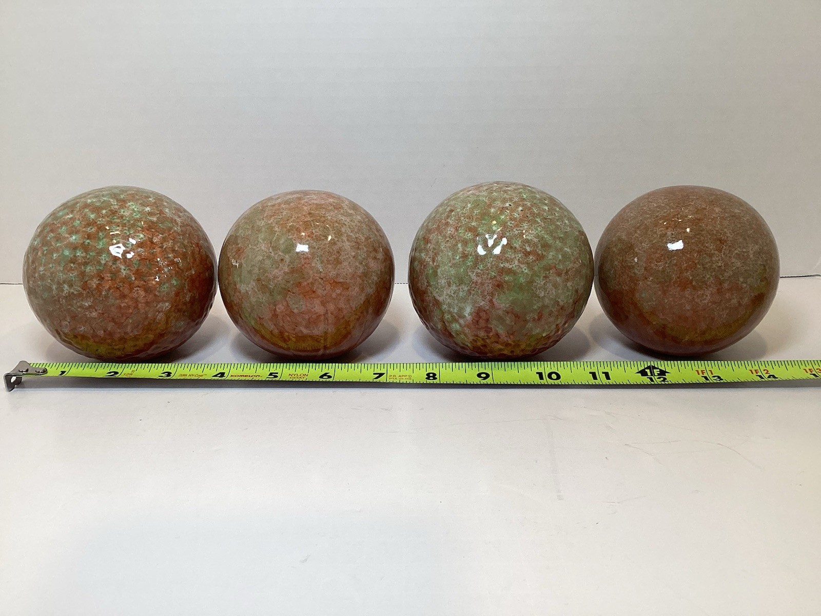 Set of 4 Glazed Ceramic 3.25” Decorative Balls in Rust and Green Colors