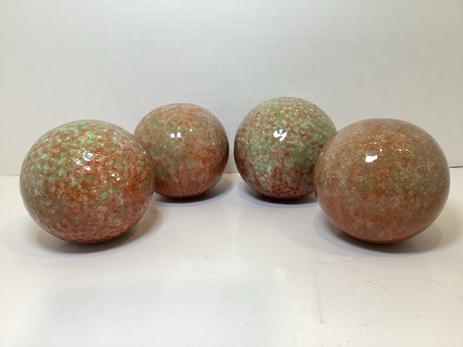 Set of 4 Glazed Ceramic 3.25” Decorative Balls in Rust and Green Colors