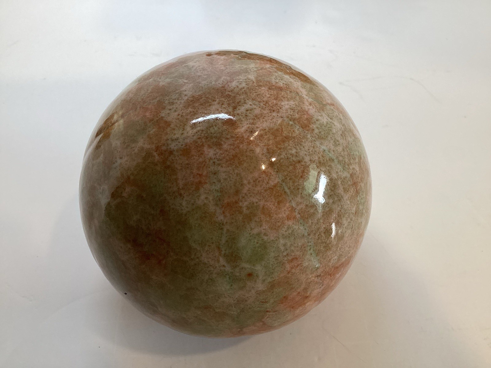 Set of 4 Glazed Ceramic 3.25” Decorative Balls in Rust and Green Colors