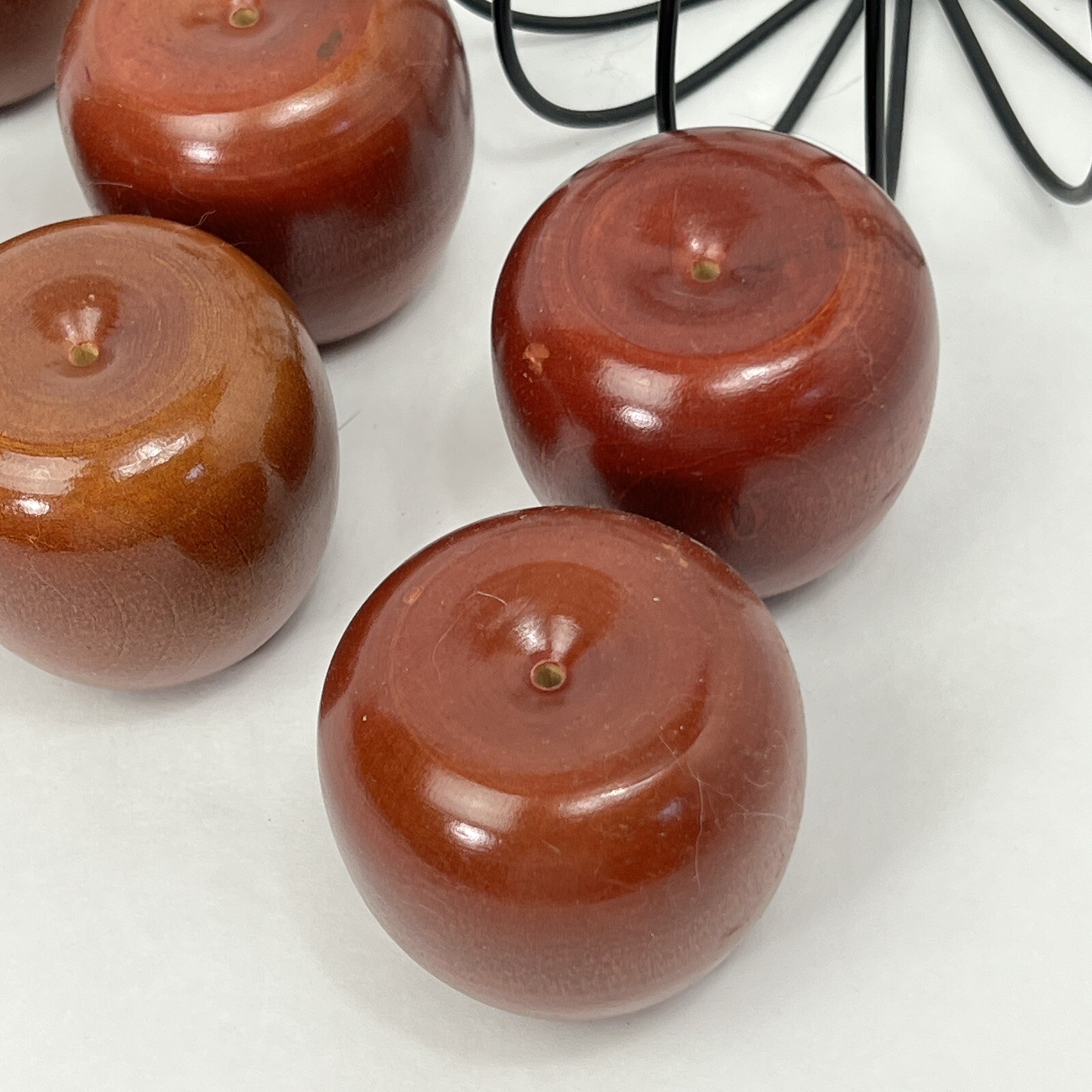 Set of 6 Decorative Wooden Apple no stem in a wired basket