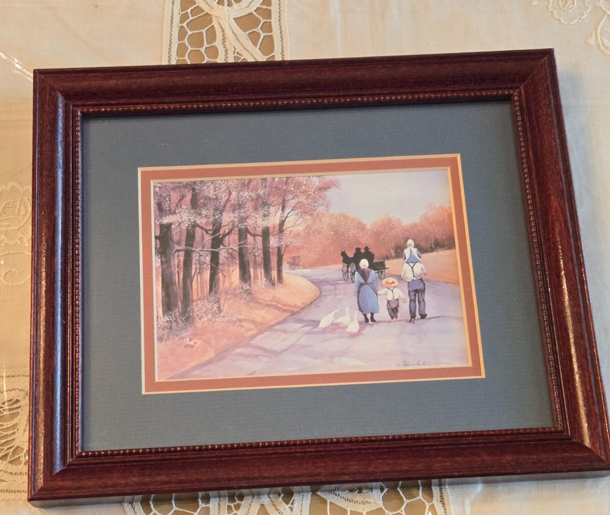 AMISH FAMILY TAKING A FALL WALK by STEVE POLOMCHAK fraamed print -11.5 x 9.5”
